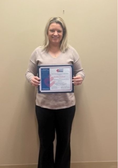 Kristin Hofland receives CCAP Photo - Click Here to See